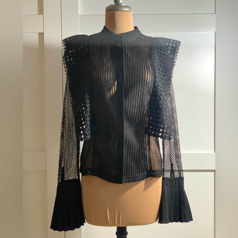 Black lace blouse with paneling and pleated cuffs by Gracia